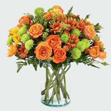 Sunset Floral Paradise, Blooms in Glass Vase, Orange Spray Roses, Chrysanthemums, Green Button Chrysanthemums, Leather Fern, Solidaster